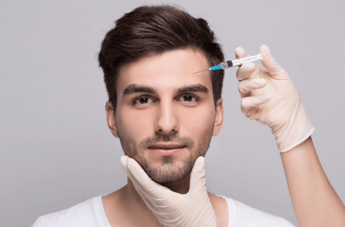 Man Receiving Botox Treatment To Enhance His Masculine Appearance
